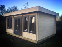 Bertsch Holzbau-Flat Roof Log Cabin 400x550 Pic 1