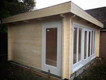 Bertsch Holzbau-Flat Roof Log Cabin 400x500 Pic 4